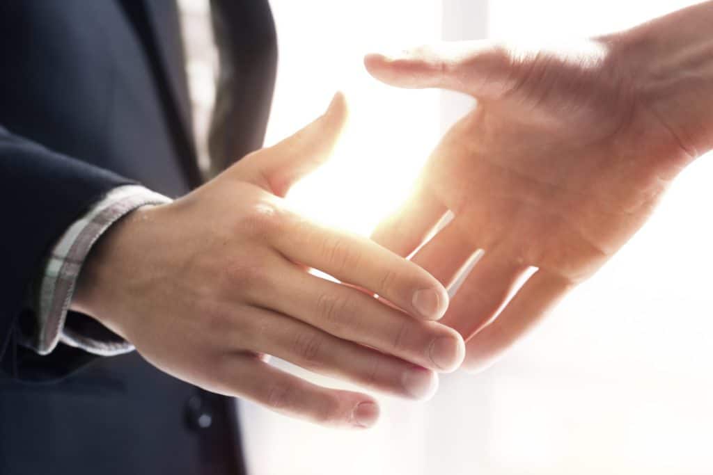 Rolf Neuweiler A2ZCFO, fractional CFO, outsourced CFO consultant, offers onsite or online accounting for audited or growth companies. (image: shaking hands)